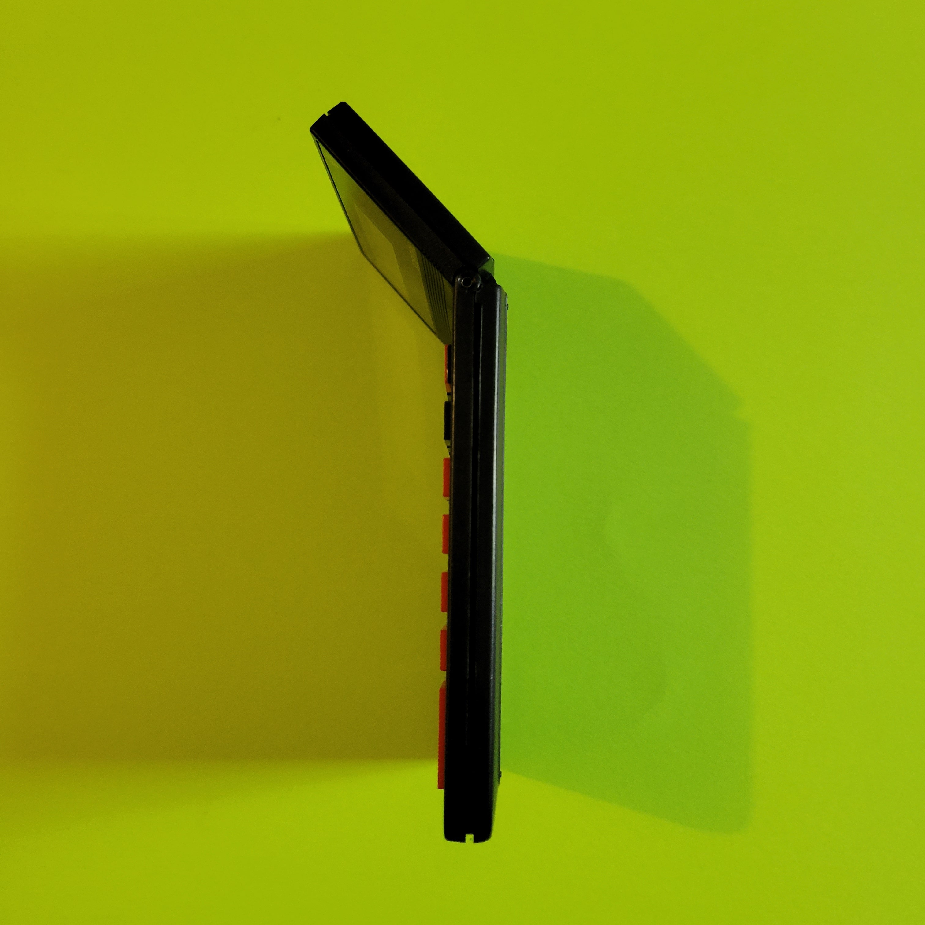 An image of the side of a texas instruments ti-32 scientific/engineering calculator